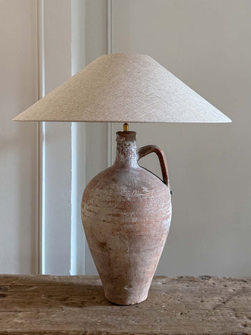 Terracotta lamp with antique ceramic base