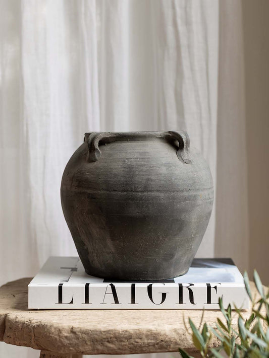 Antique clay pot with handles