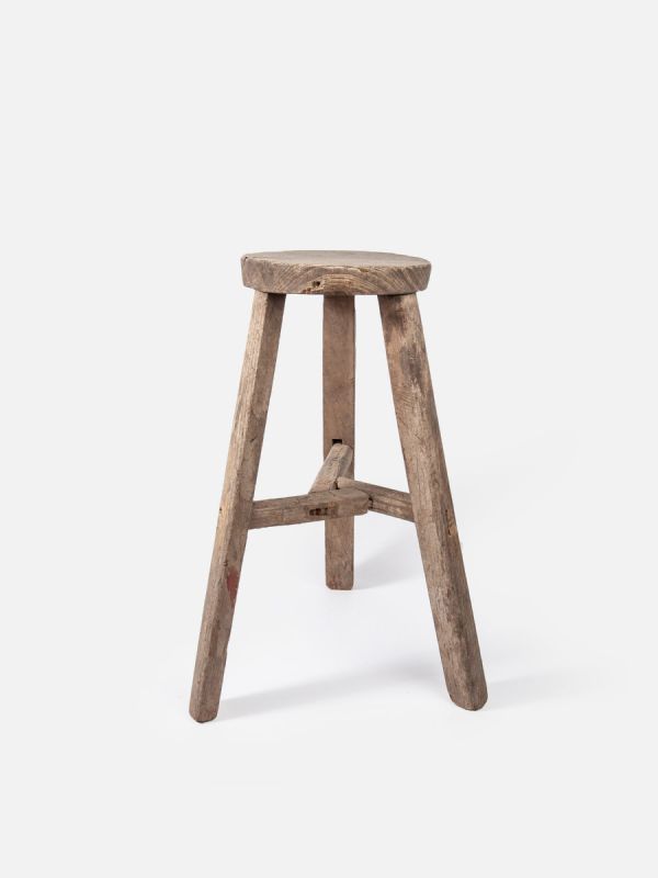Rustic round stool brutalism